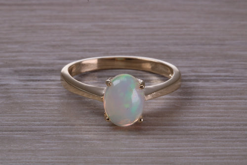 Oval cut Natural Opal set Yellow Gold Ring