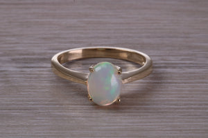 Oval cut Natural Opal set Yellow Gold Ring