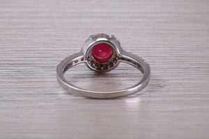 One and Half carat Stunning Ruby and Diamond Halo set Ring