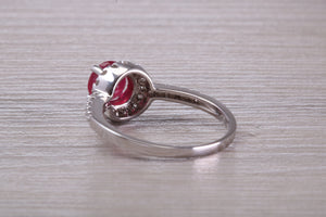 One and Half carat Stunning Ruby and Diamond Halo set Ring