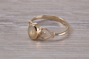 Natural Oval cut Opal set Yellow Gold Ring