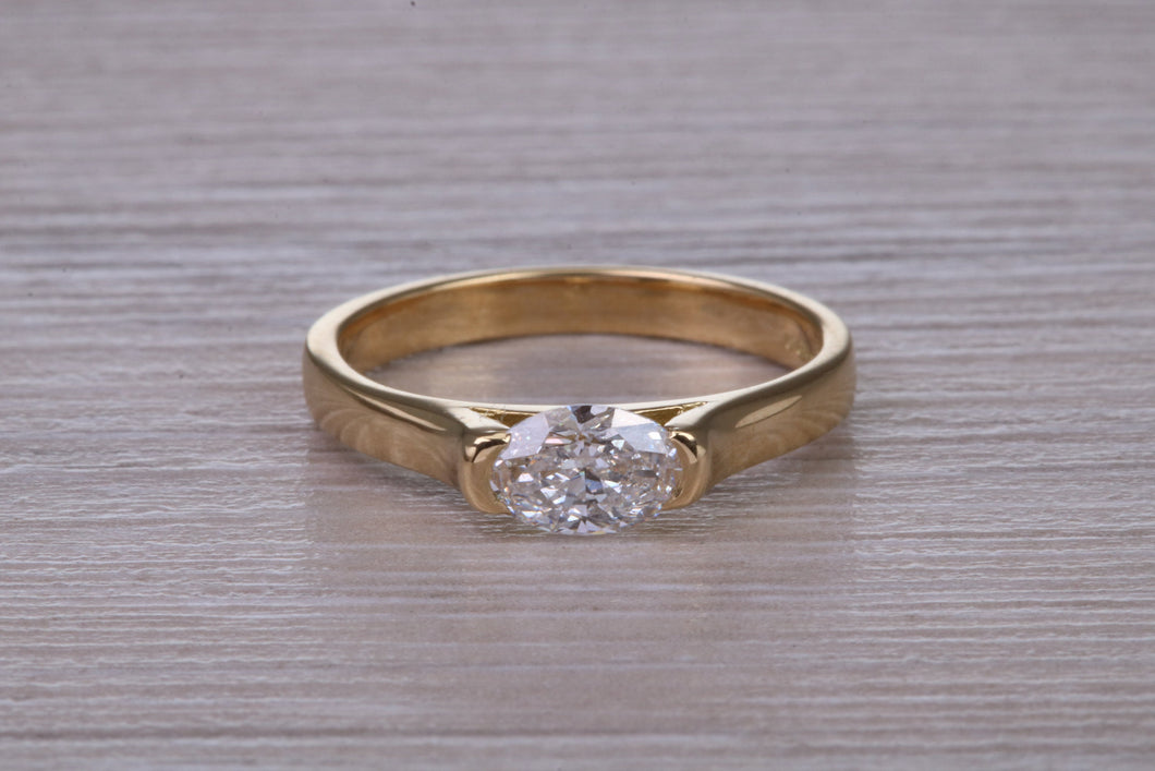 Half carat Oval cut Certified Natural Diamond set 18ct Yellow Gold Solitaire