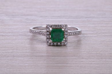 Square cut Natural Emerald Halo and Shoulder set With Diamonds in This 18ct White Gold Ring