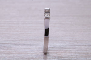 Half carat Baguette and Square Princess cut Diamond set 18ct White Gold Eternity Ring