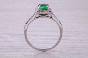 Square cut Natural Emerald Halo and Shoulder set With Diamonds in This 18ct White Gold Ring