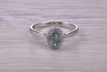 Load image into Gallery viewer, Oval cut Alexandrite And Halo Diamond set 18ct White Gold Ring