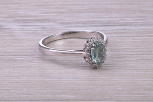 Oval cut Alexandrite And Halo Diamond set 18ct White Gold Ring