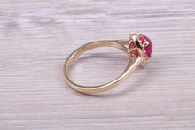 Load image into Gallery viewer, Stunning Cabochon cut 1.40 carat Ruby and Halo set Diamond Ring in Yellow Gold