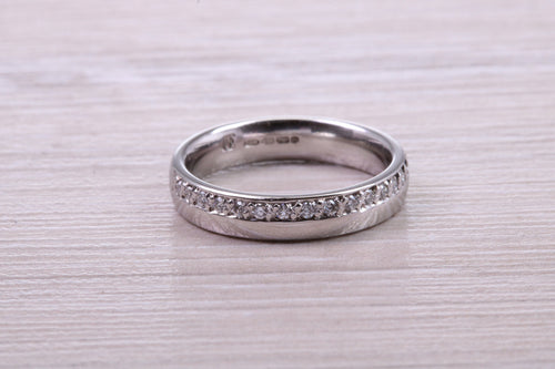 Half Circle Round Brilliant cut Diamonds set in 18ct White Gold Band