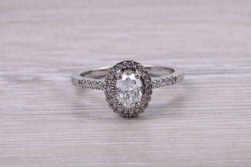 0.80ct E VS2 Oval cut GIA Certified Natural Diamond Halo set Platinum Ring