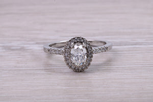 0.80ct E VS2 Oval cut GIA Certified Natural Diamond Halo set Platinum Ring