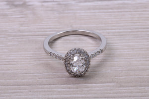0.80ct E VS2 Oval cut GIA Certified Natural Diamond Halo set Platinum Ring