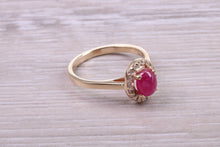 Load image into Gallery viewer, Stunning Cabochon cut 1.40 carat Ruby and Halo set Diamond Ring in Yellow Gold