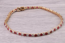 Load image into Gallery viewer, Four carats Natural Rubies and Diamonds set Solid Yellow Gold Tennis Bracelet, British Hallmarked