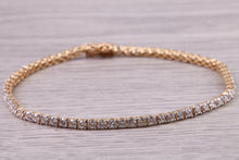 Load image into Gallery viewer, Three and Half carats Natural Diamonds set Yellow Gold Tennis Bracelet, British Hallmarked