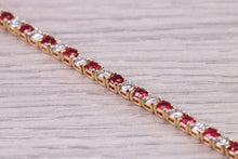 Load image into Gallery viewer, Four carats Natural Rubies and Diamonds set Solid Yellow Gold Tennis Bracelet, British Hallmarked