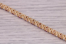Load image into Gallery viewer, Four carats Natural Rubies and Diamonds set Solid Yellow Gold Tennis Bracelet, British Hallmarked