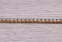 Load image into Gallery viewer, Three and Half carats Natural Diamonds set Yellow Gold Tennis Bracelet, British Hallmarked