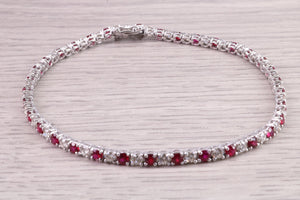 Four carats Natural Rubies and Diamonds set Solid White Gold Tennis Bracelet, British Hallmarked