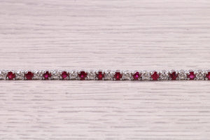 Four carats Natural Rubies and Diamonds set Solid White Gold Tennis Bracelet, British Hallmarked