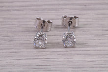 Load image into Gallery viewer, Half carat Diamond Solitaire set 18ct White Gold Stud Earrings